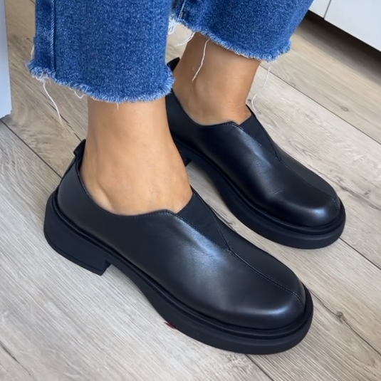 Women's black leather loafers