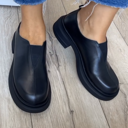 Women's black leather loafers