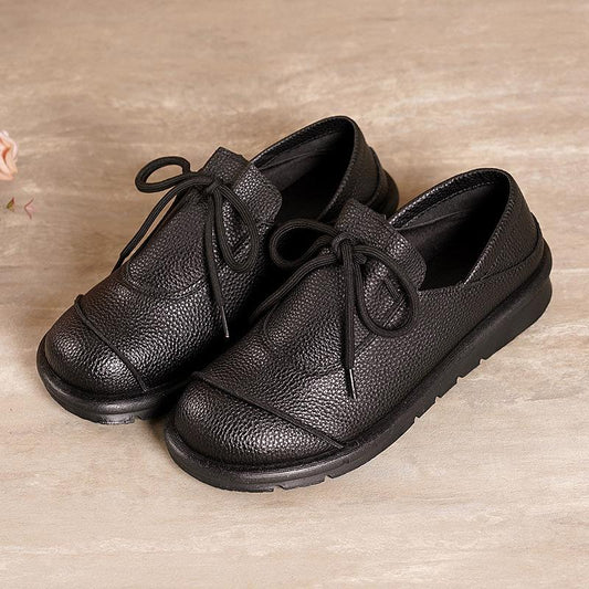 Women's lace-up flat shoes